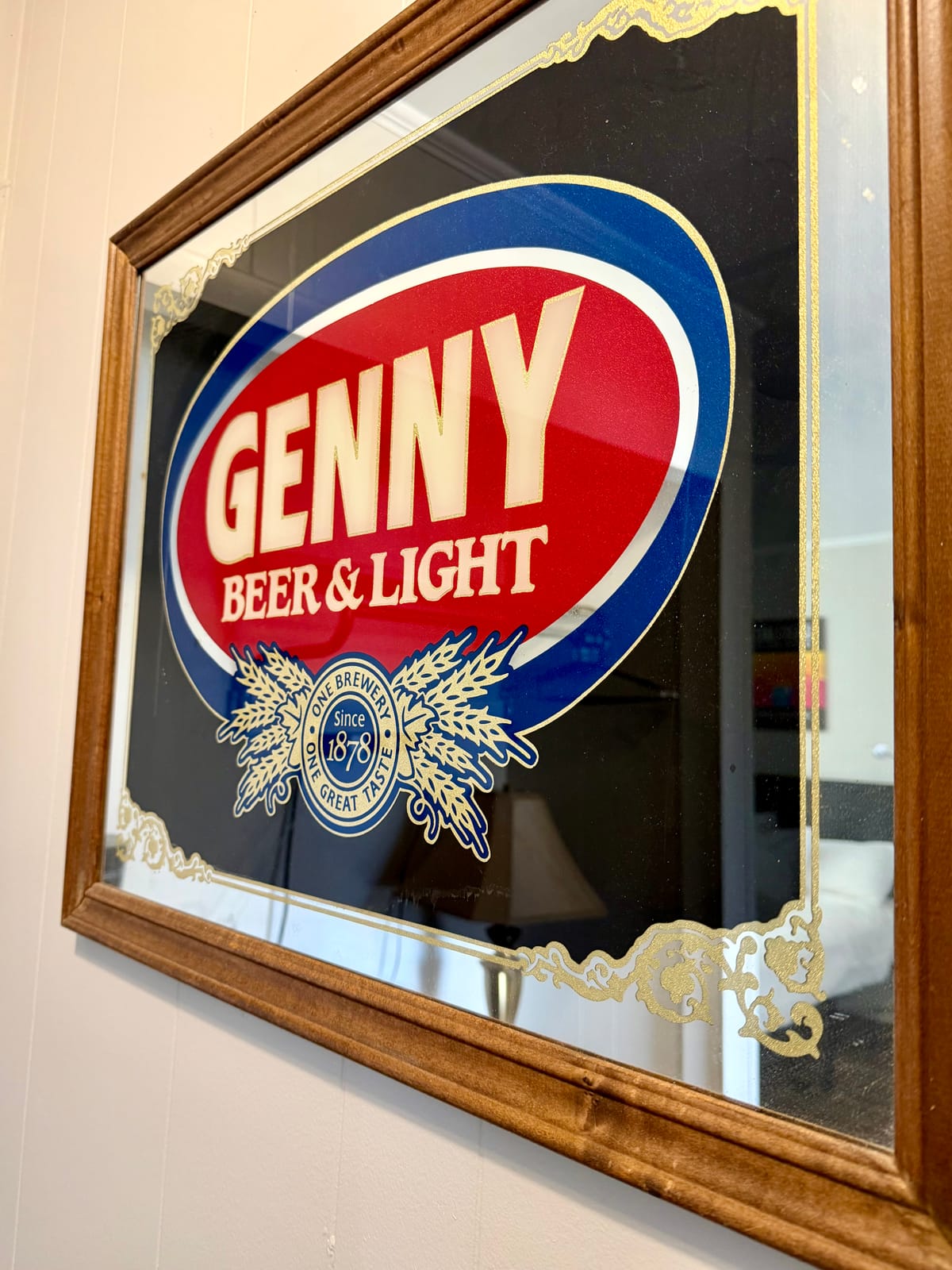 The Brewmaster's Room — vintage Genny Beer & Light decorative mirror in ornate wood frame