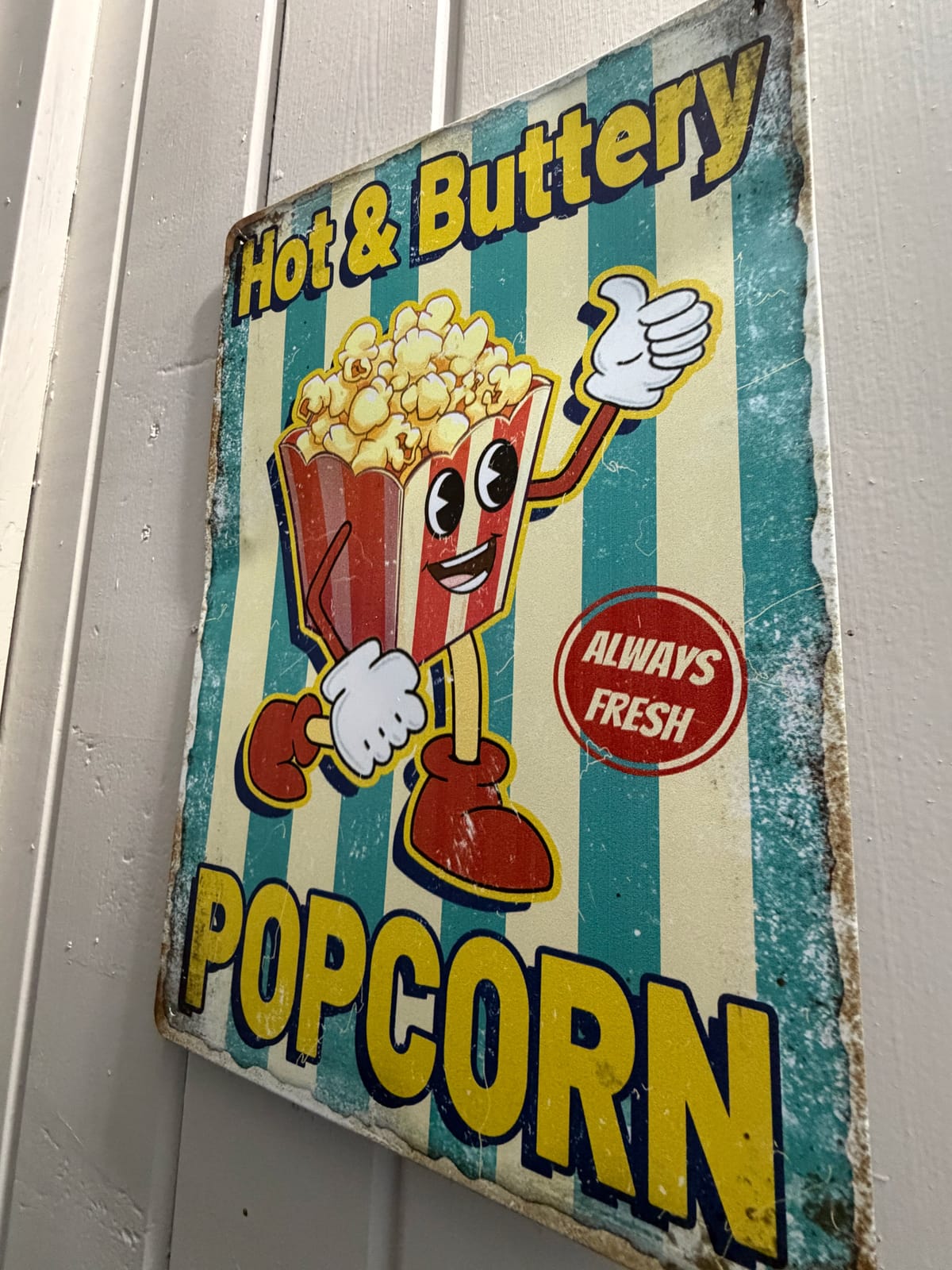 The Movie Room — retro Hot & Buttery Popcorn metal sign with cartoon popcorn character