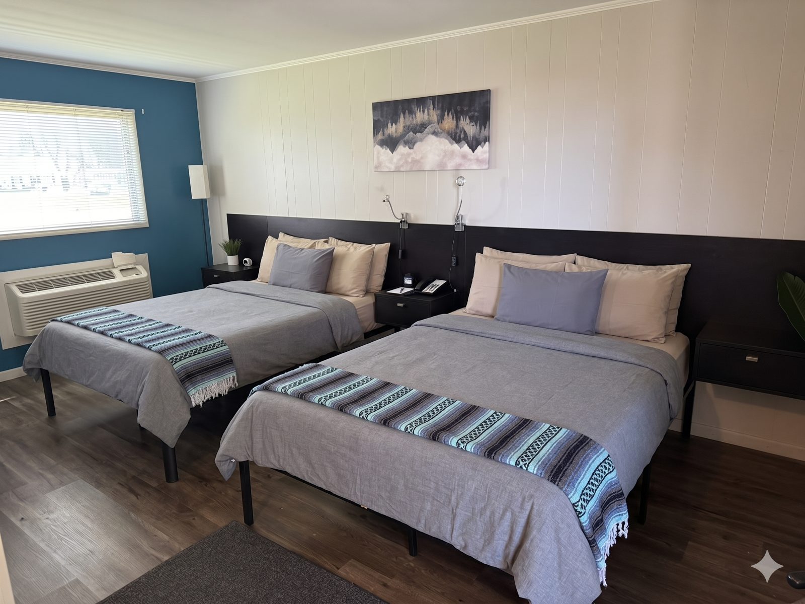 The Naturalist's Cabin, a two-queen room at The Cedar